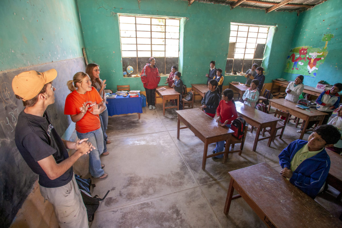 Short-term volunteers lead a middle school class in songs, Bible stories and a time of prayer.The volunteers came to serve in the Santiago de Chocorvos District of Peru.